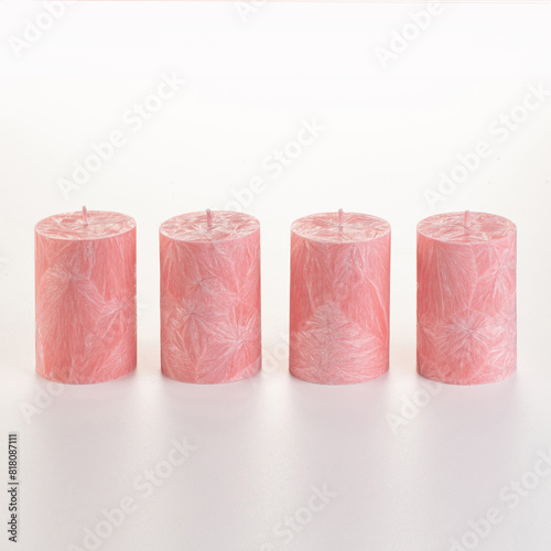 Two artisan pink palm wax candles, perfect for daily comfort and excellent gift choice, presented against white background