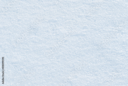 Fresh sparkling blue snow close-up, perfect as a winter season background or texture