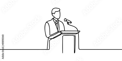 A man in a suit behind the podium, one continuous line of speeches on the podium