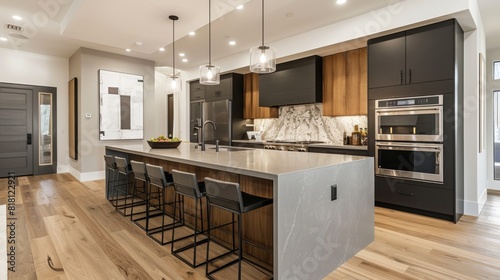 Wallpaper Mural Modern kitchen with sleek cabinetry, an island with bar seating, and high-end appliances Torontodigital.ca