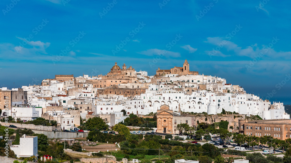 Obraz premium View of Ostuni white town, Brindisi, Puglia (Apulia), Italy, Europe. Old Town is Ostuni's citadel. Ostuni is referred to as the White Town. Ostuni white town skyline and church, Brindisi, Italy.