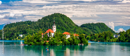 Lake Bled in Slovenia. Beautiful mountains and Bled lake with small Pilgrimage Church. Bled lake and island with Pilgrimage Church of the Assumption of Maria. Bled, Slovenia, Europe. photo