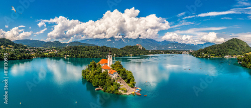 Lake Bled in Slovenia. Beautiful mountains and Bled lake with small Pilgrimage Church. Bled lake and island with Pilgrimage Church of the Assumption of Maria. Bled, Slovenia, Europe. photo