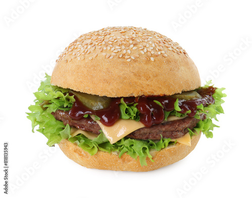 Delicious cheeseburger with lettuce, pickle, ketchup and patty isolated on white