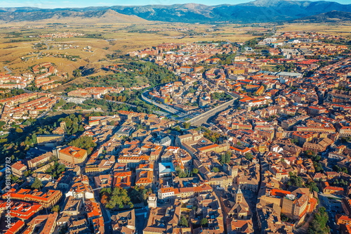 Bird-eye view of an ancient European town. Ancient houses, temples. City among the hills © romankrykh