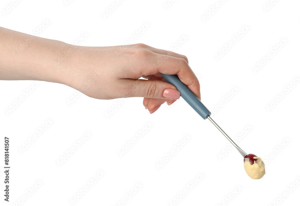 Tasty fondue. Woman holding fork with grape and melted cheese on white background, closeup Tasty fondue. Woman holding fork with grape and melted cheese on white background, closeup