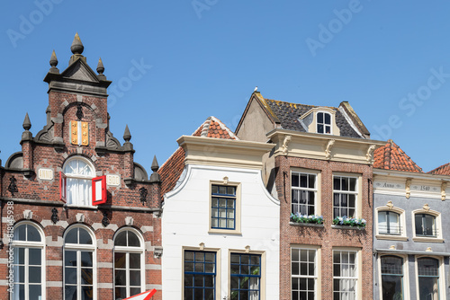 Facades of historic buildings on the market square in Gouda.