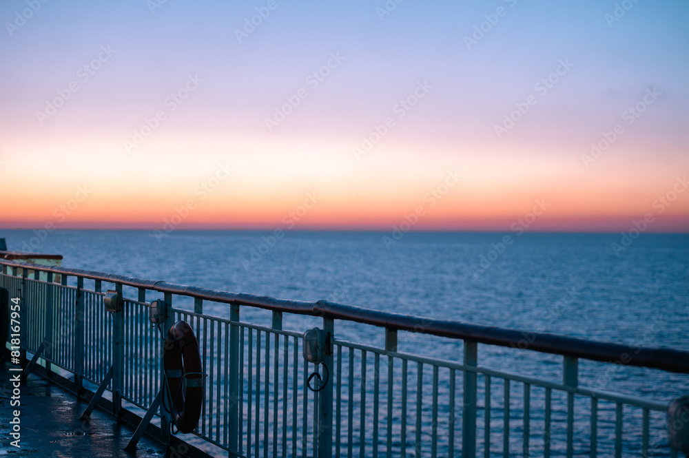 Obraz premium Sunrise from Ferry from Barcelona to Ibiza in summer 2024