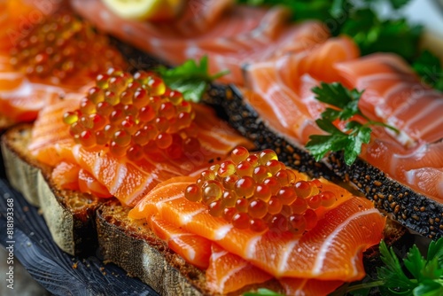 Fish Platter with Light-Salted Salmon, Smoked Salmon, Red Caviar and Black Bread Toast