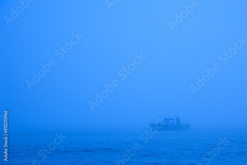 Fisherman In Fog © Designpics