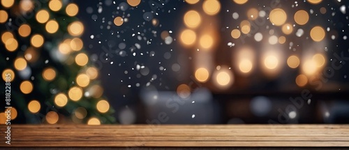 A beautiful wooden table with a christmas tree decorations in the blur background 