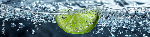 Refreshing Lime Slice Submerged in Sparkling Water with Bubbles