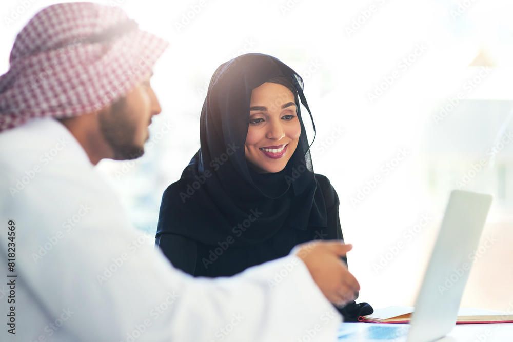 Muslim, people and coworking teamwork on project and mentor help on laptop in Dubai office. Arab, man and woman in business learning, training or collaboration with professional advice from manager Muslim, people and coworking teamwork on project and mentor help on laptop in Dubai office. Arab, man and woman in business learning, training or collaboration with professional advice from manager