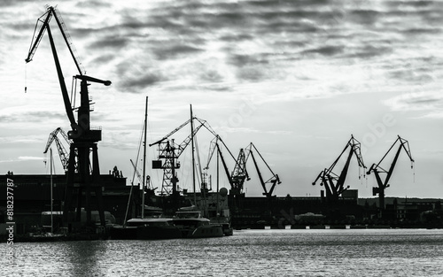 Obraz na płótnie Cranes of the Gdansk shipyard in black and white, Baltic coast w salonie