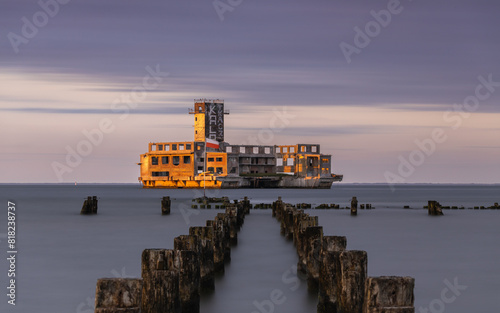 Obraz na płótnie Old torpedo station in Gdynia at sunset, Baltic coast w salonie