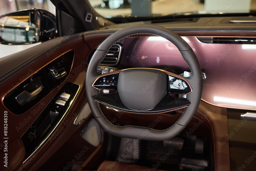 Fototapeta premium Vehicle with seating and steering wheel, interior design