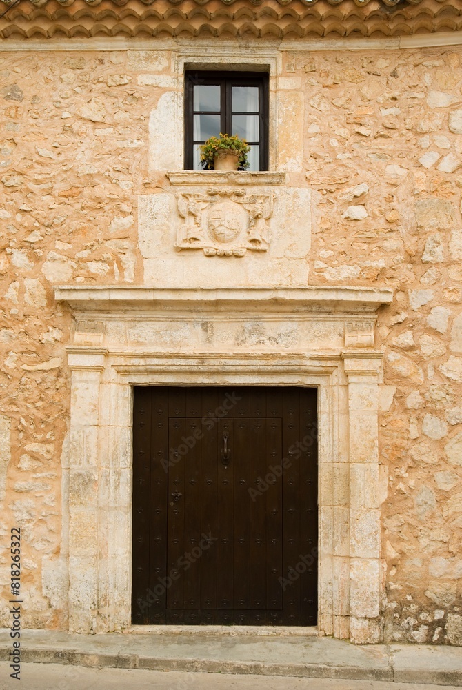 Typical Door And Window With Coat Of Arms At Castilla - La Mancha, Spain