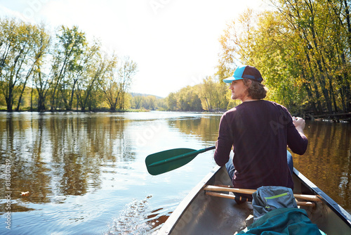 Photography Man, canoeing and lake rowing in nature for morning adventure or exercise, exploring or island