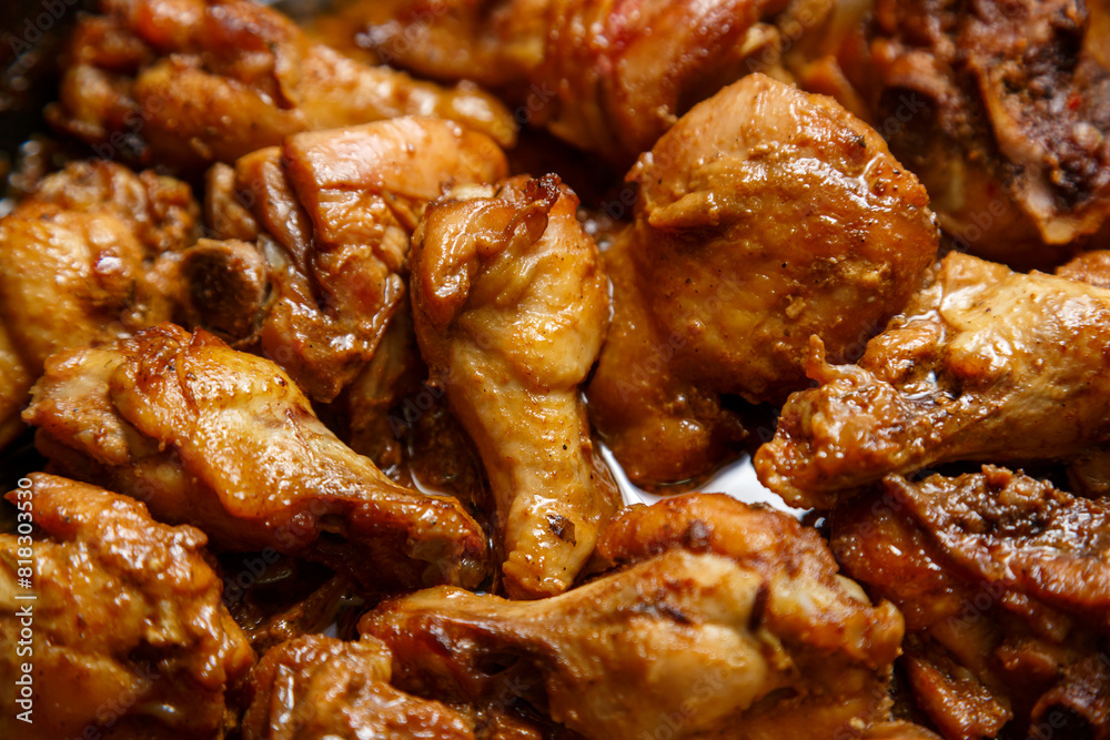 chicken breast pieces in a frying pan stewed in sauce chicken breast pieces in a frying pan stewed in sauce