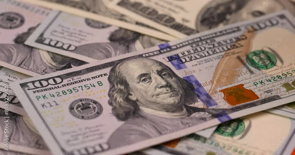 American cash dollars close-up , a large amount of cash American dollars in cash paper bills American cash dollars close-up , a large amount of cash American dollars in cash paper bills
