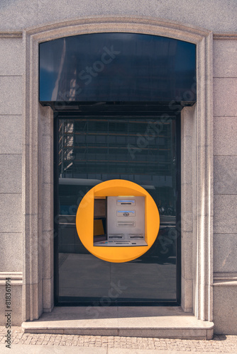 Madrid City ATM Machine in Bold Yellow Circle