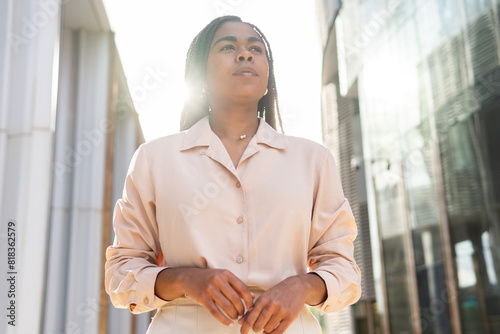 Confident businesswoman in Barcelona summer setting