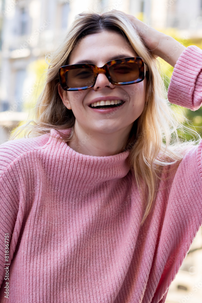 Beautiful woman strolling and shopping in the street Beautiful woman strolling and shopping in the street