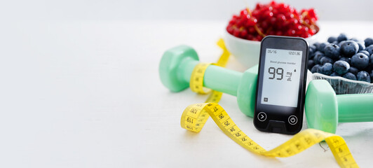 Diabetes diet, glucometer and vegetables on table