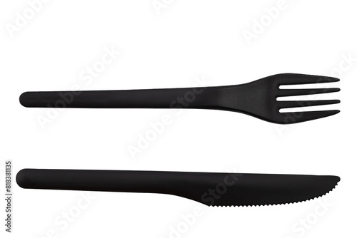 disposable table knife made of black food-grade plastic, insulated on a white background