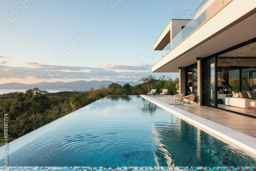   A luxurious modern villa with a swimming pool that features a glass edge  creating a seamless visual effect with the surrounding landscape  captured in stunning detail.