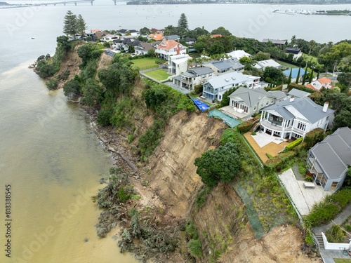 Quadro su tela Erosion flood damage of Pohtukawa trees falling from the cliffs from severe storms