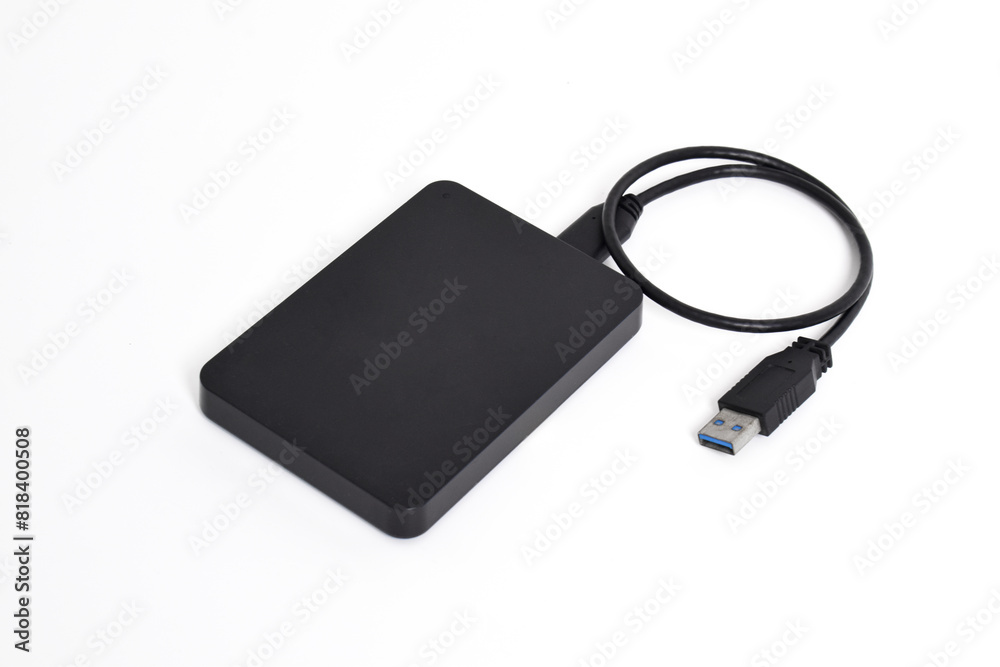 External Hard Disk drive with usb cable isolated on white background. External HDD with usb connector External Hard Disk drive with usb cable isolated on white background. External HDD with usb connector