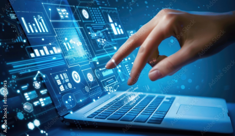 A hand touching the screen of an open laptop A hand touching the screen of an open laptop