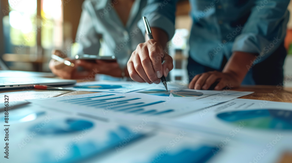in the meeting, discussion as they read a marketing report and planning analyze investment and marketing in the office. in the meeting, discussion as they read a marketing report and planning analyze investment and marketing in the office.
