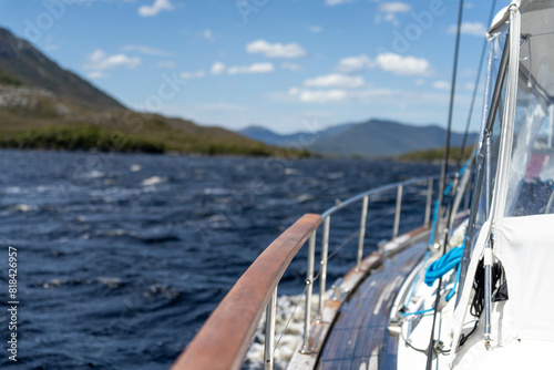 sailing on a yacht in the australian in the remote forest wilderness in spring in australia photo