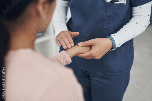 Woman  doctor and hands with patient for physiothreapy  wrist pain or injury at hospital. Closeup of medical employee  nurse or therapist monitoring arm for checkup  health or joint ache at clinic