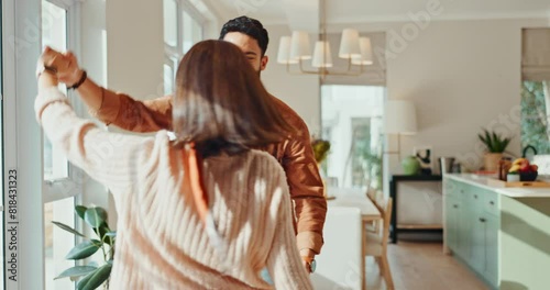 Love, dance and couple in home for fun, bonding and loving relationship in living room. Dating, marriage and happy man and woman dancing together for relaxing, listening to music and enjoy weekend