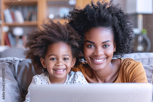 Happy Afro mother and daughter having fun together, love and family