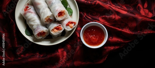 bowl with ai trang vietnamese spring rolls and a bowl with rice, in the style of dark white and red, gossamer fabrics photo