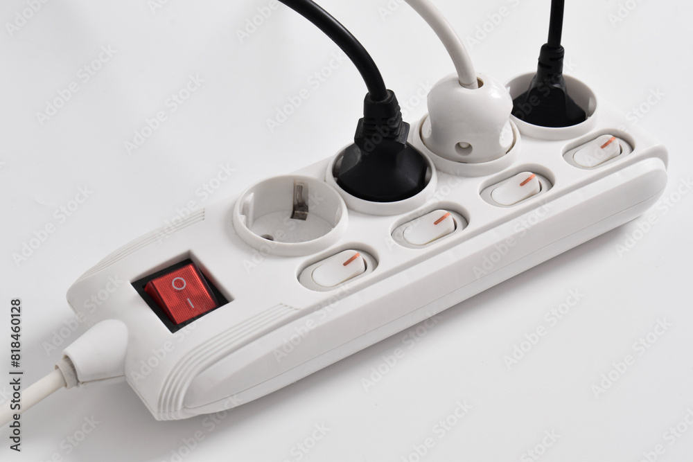 Electrical plug in outlet socket at home isolated on white background, Outlet, Electric Plug, Power Cable, a power button and a connected electrical plug Electrical plug in outlet socket at home isolated on white background, Outlet, Electric Plug, Power Cable, a power button and a connected electrical plug
