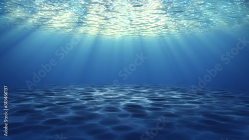 Majestic Underwater scene of deep blue water sea, Underwater sandy seafloor and reflected rays of sunlight below water surface. ocean, sea life.