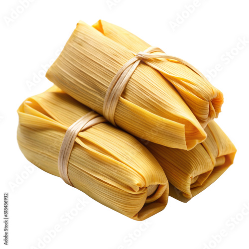 Delicious pamonha wrapped in corn husk on white background