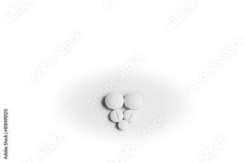 Five white generic pills arranged in a heart shape on white background.