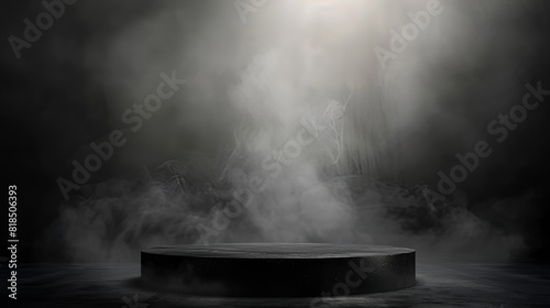 An empty cylindrical product display podium against a dark abstract wall with drifting smoke photo