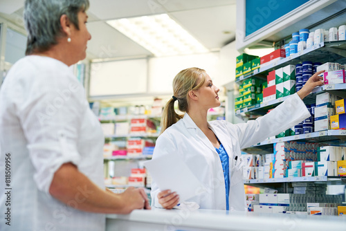 Pharmacist, shop and help customer with medicine, pills or drugs on shelf for healthcare. Pharmacy, shopping and woman in store with sale, choice or prescription antidepressants, antibiotics or stock