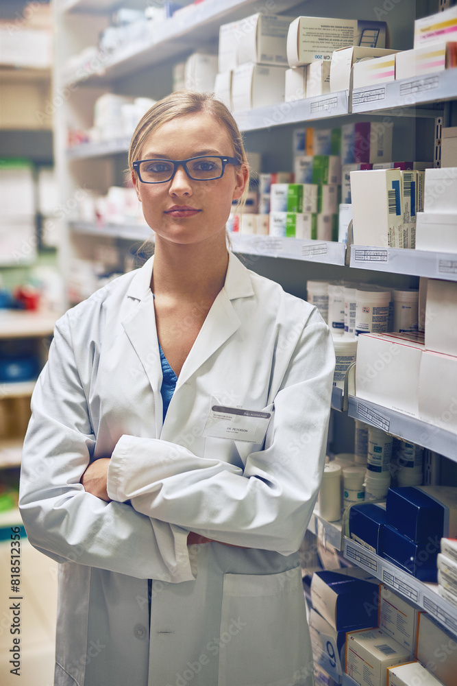Serious, pharmacist or portrait of woman with arms crossed in healthcare clinic, pharmacy or drugstore. Proud, wellness or confident doctor by shelf for medication, pills or medicine ready to help