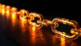 
Chains illuminated by orange lights on black background. Horizontal composition with copy space. 