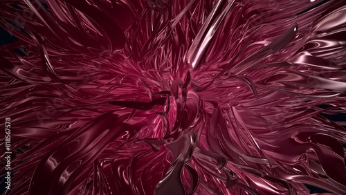 Vibrant 3D rendering of a fluid, swirling red form composed of intricate, curving lines. The dynamic motion and rich color imbue the image with depth and energy
