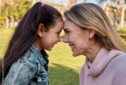 Park, forehead and mother with girl, love and sunshine with nature, bonding together and weekend break. Outdoor, smile and single parent with happy child, daughter and kid with fun, summer or playful