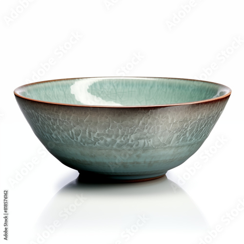 Handmade ceramic bowl with a celadon glaze Isolated on a white background
